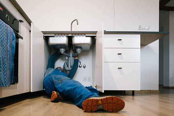 Professional Drain Cleaning technician working in Clermont, FL